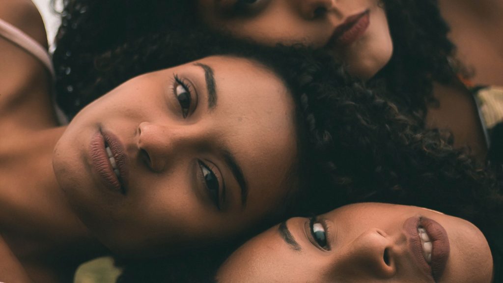 Closeup of three women of beauty.